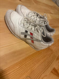 12K White and Red Athletic Shoes