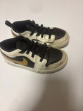 Nike Black and Gold Sneakers
